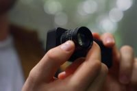person taking a photo with ACFLOW Snap