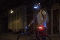 Cyclist with AURA helmet
