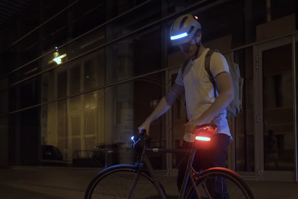 Cyclist with AURA helmet