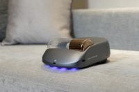 Creatulize X1 on a grey fabric surface with blue lighting