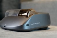 Close-up of Creatulize X1 robot vacuum on fabric surface