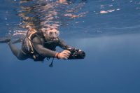 Diver photographing underwater with the LEFEET P1 scooter