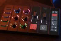Close-up of modue control surface with colorful backlit dials