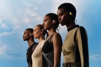 Four athletes profiled wearing OWS Sports earphones