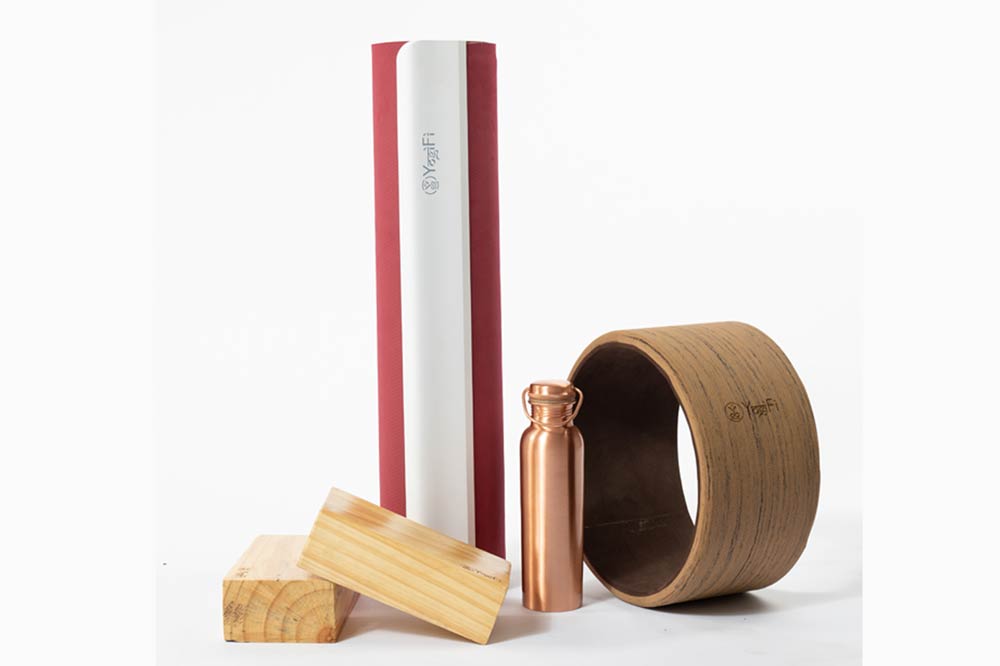 YogiFi Smart Yoga Mat accessories including blocks and a wheel