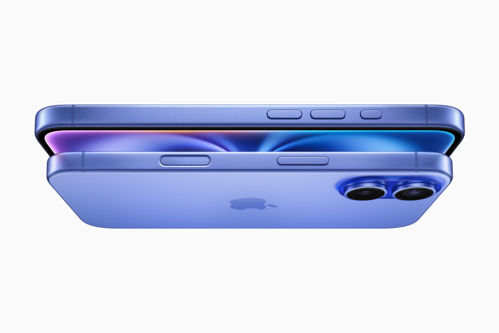 Side view of two stacked iPhone 16 devices in blue, showcasing the slim design and dual camera lenses.